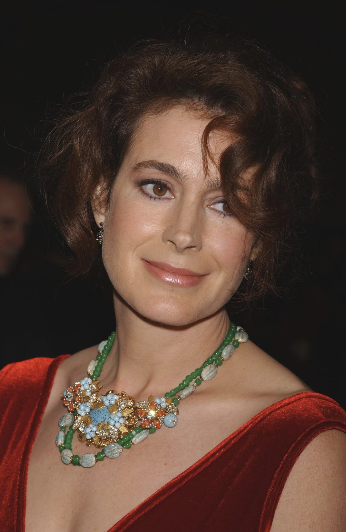 Sean Young at an evening event in red